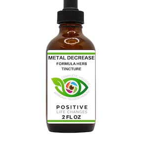 Puede incluir: Una botella de vidrio marrón con un gotero, etiquetada "Metal Decrease Formula Herb Tincture". La etiqueta también presenta un ojo verde con un iris arcoíris y el texto "Complete Holistic Approach to Good Health" y "Positive Life Changes 2 fl oz".