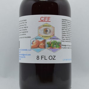 May include: A brown glass bottle with a label that reads "CFF" and "8 FL OZ". The label also includes a diagram with the words "Tridiology", "Sclerology", "Massage", and "Herbology". The bottle contains a dark liquid.