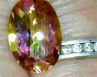 Northern Lights, Mystic Topaz, is its Multi-color flashes to its golden base color, 14x10mm Oval OR 10mm Square Cushion cut