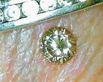 A quarter carat medium dark Champagne Diamonds, April Birthstone, an Promise or Engagement ring in the making...