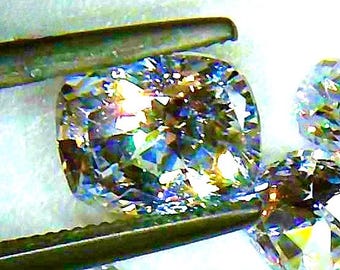Pair of White Cubic Zirconia, Diamond like color flashes from an 8.5 x 6.5mm Rectangular Cushion Cut loose gemstones