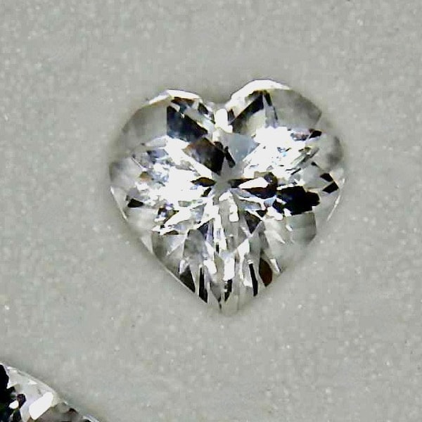 The other Beryl, Goshenite, Crystal clear Heart Shaped Loose Gemstones, 5.5mm hearts are.55ct min., have the hardness of of Aqua or Emeralds