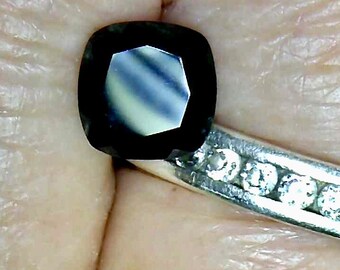 A Pair of Coal Black Natural Spinel, 7mm Sq. Cushion cut, 4 CTW average for unisex jewelry pieces earrings, cufflinks matching...