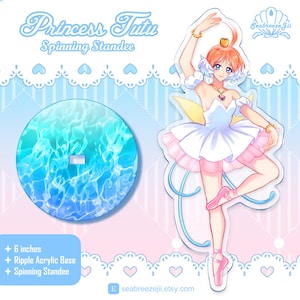 May include: A Princess Tutu spinning standee featuring a ballerina illustration. The standee has a 6-inch ripple acrylic base. The ballerina is in a white tutu with pink accents, and the base has a blue and turquoise water design. The text "Princess Tutu Spinning Standee" is at the top.