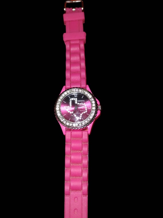 Really groovy pink Texas state rhinestone watch