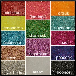 May include: A collection of 12 glitter jars with different colors and names, including mistletoe, flamingo, citrus, lemondrop, savannah, shamrock, seabreeze, madi, sugarplum, froz&eacute;, peacock, silver bells, snow, and licorice.