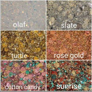 May include: A close-up of six different glitter colours, labelled "olaf", "slate", "turtle", "rose gold", "cotton candy", and "sunrise".