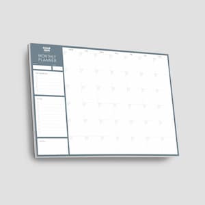 May include: A rectangular monthly planner pad with a slate blue border and header. The layout includes a grid for days of the week, a section for top priorities, a to-do list with checkboxes, and a notes area. The text reads Clear Mind Monthly Planner.