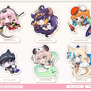 Pode incluir: Uma coleção de seis chaveiros VTuber coloridos. Cada chaveiro apresenta um personagem único em estilo anime com designs detalhados e nomes: Mori Calliope, Ninomae Ina'nis, Takanashi Kiara, ISO (Valorant), Nimi Nightmare e Sameko Saba.