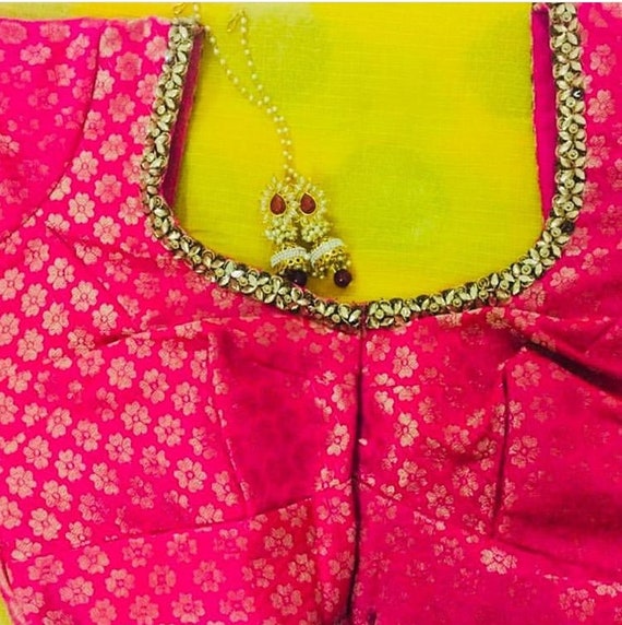 pink and yellow blouse