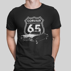 1965 Chevy Corvair Front Three Quarter View With Highway Sign T Shirt
