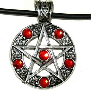 May include: Silver pendant necklace with a pentagram design and red gemstone accents.