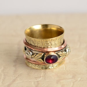 Mozambique Garnet Spinner Ring: Sterling Silver Meditation Band