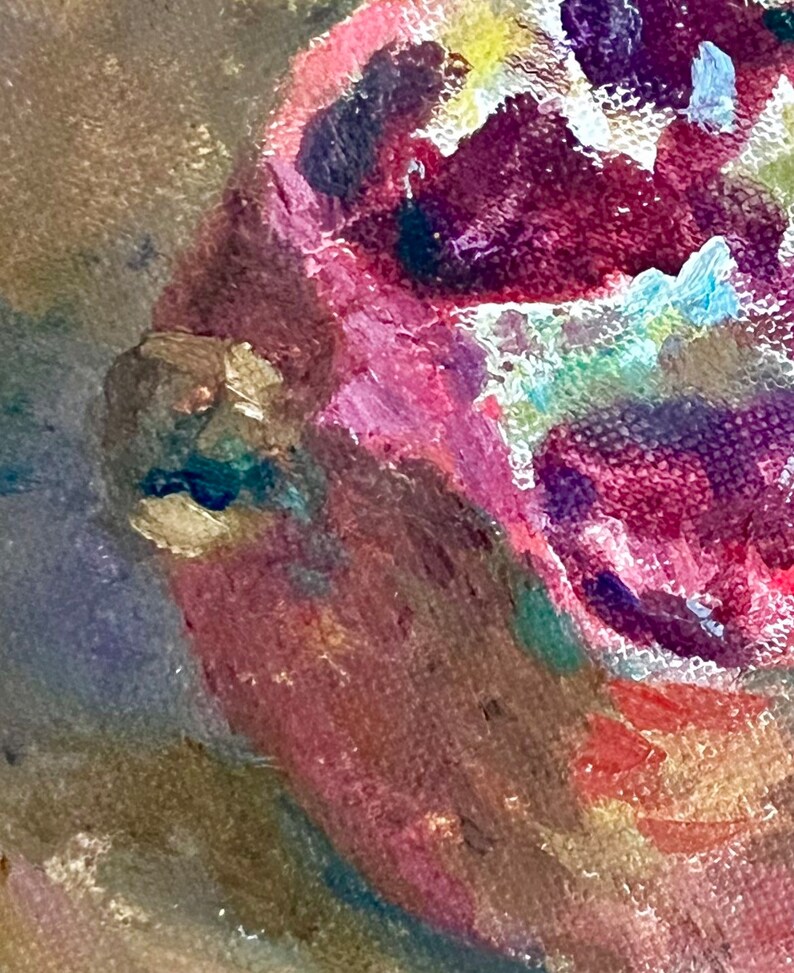 May include: Close-up of a painting of a red, purple, and gold fruit. The fruit has a textured surface and is painted in a loose, impressionistic style.