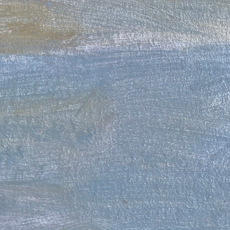 Puede incluir: Primer plano de una superficie pintada de azul claro con pinceladas visibles. La superficie tiene una textura sutil y un aspecto ligeramente granulado.
