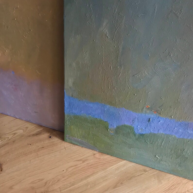 May include: Two abstract paintings with textured surfaces. The painting on the left is a gradient of brown, purple, and pink. The painting on the right is a gradient of green, blue, and purple.