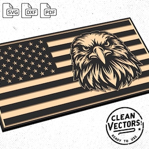 May include: A black and white illustration of an American flag with an eagle's head in the center. The eagle has a fierce expression and its feathers are detailed. The flag is on a wooden background.