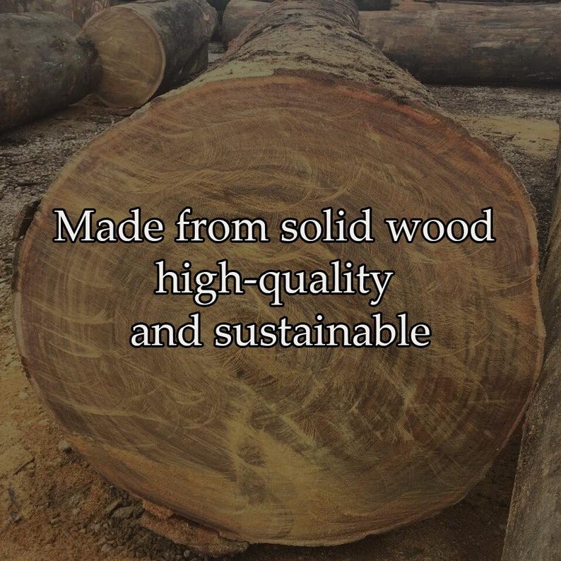May include: A close-up of a cross-section of a large, brown log with visible wood grain. The text "Made from solid wood high-quality and sustainable" is overlaid on the image. The log is part of a larger collection of logs.