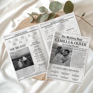 May include: Three newspaper-style wedding programs with black text and photos. The headlines include "The Big Day!", "The Wedding Days", and "Let the Fun Begin". The programs feature wedding details, a timeline, and fun facts about the couple.
