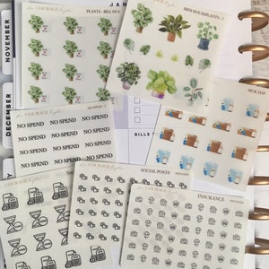 May include: A set of clear planner stickers with various designs, including plants, houses, taxes, social media icons, and insurance icons. The stickers are labeled with the text "Courage to Plan" and "Tiny Icons".