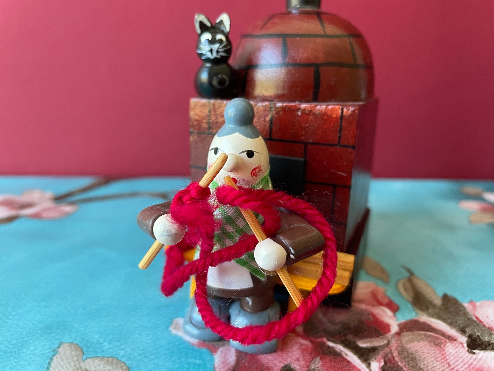 Vintage Smoker Knitting Grandma at Fireplace