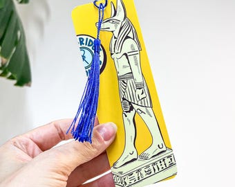 Marcapáginas con la estatua egipcia de Horus Anubis, con lámina dorada a doble cara, inspirado en la película.