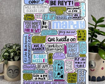 May include: A white print featuring various phrases in speech bubbles, including "Sweating cobs!", "Be reyt!", and "Get kettle on". The print has a whimsical, hand-drawn style with a variety of fonts and colors. The overall theme is humorous and conversational.