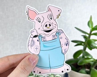 Pegatina de vinilo de hucha. Pegatina retro de los 80 con diseño de cerdito tatuado.
