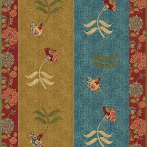 May include: A patterned rug with a patchwork design featuring a repeating floral motif in shades of red, blue, and gold. The rug has a border of intricate floral designs.
