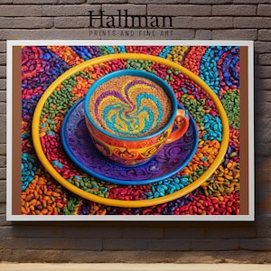 May include: A colorful ceramic coffee cup with a swirling design sits on a matching saucer. The cup and saucer are surrounded by a bed of colorful seeds.