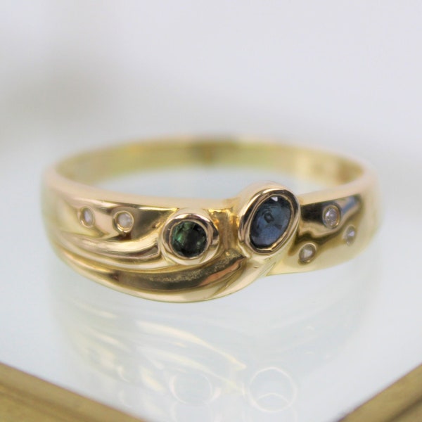 Multistone Goldring, 14 carat with sapphire, tourmaline, diamonds