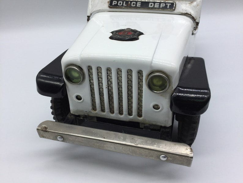 JOUET ANCIEN TN NOMURA POLICE PATROL JEEP TIN BATTERY OP VERS 1960 TYPE 1 L 27CM JOUET ANCIEN TN NOMURA POLICE PATROL JEEP TIN BATTERY OP VERS 1960 TYPE 1 L 27CM
