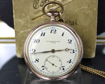 Reloj de bolsillo plateado, CH. F. Tissot & Fils Locle, Suiza alrededor de 1910 (Reloj de bolsillo de plata, CH. F. Tissot and Fils Locle, Suiza alrededor de 1910)