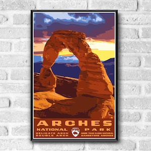 May include: A vintage-style poster for Arches National Park in Utah. The poster features a colorful illustration of Delicate Arch, a natural sandstone arch formation. The text on the poster reads "Arches National Park", "Delicate Arch", "Double Arch", and "More than 2,000 Natural Sandstone Arches".