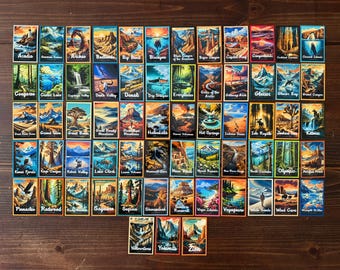 May include: A collection of 50 colorful illustrated stickers featuring national parks in the United States. Each sticker features a unique design with the name of the park and a scenic image.