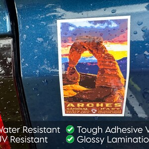 May include: A sticker featuring a colorful illustration of Delicate Arch in Arches National Park, Utah. The sticker is water resistant, UV resistant, and has a tough adhesive vinyl with a glossy lamination.