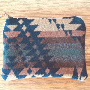 Pendleton Wool Pouch Southwest Design Tribal Pattern Zippered Bag Accessory Men Travel Organizer Coin Purse Western Style Handcrafted Central Oregon Mission Trails Earth Tone Colors Brown Green Gold Black Cream Heritage Craftsmanship Gift