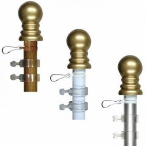 May include: Three gold finials for flagpoles, each with a different style of base. The finials are shown mounted on different types of flagpoles: wood, white plastic, and silver metal.