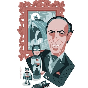 May include: A smiling man with a gray suit and a white shirt is holding a Batman figurine. Behind him is a framed picture of Batman in a dark blue suit. There are two more Batman figurines and a black Batmobile on a table in front of him.