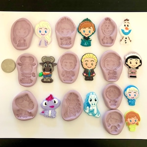 May include: A set of 16 silicone molds featuring various characters from the animated film Frozen. The molds are purple and feature characters such as Olaf, Elsa, Anna, Kristoff, Sven, and the snow monster.