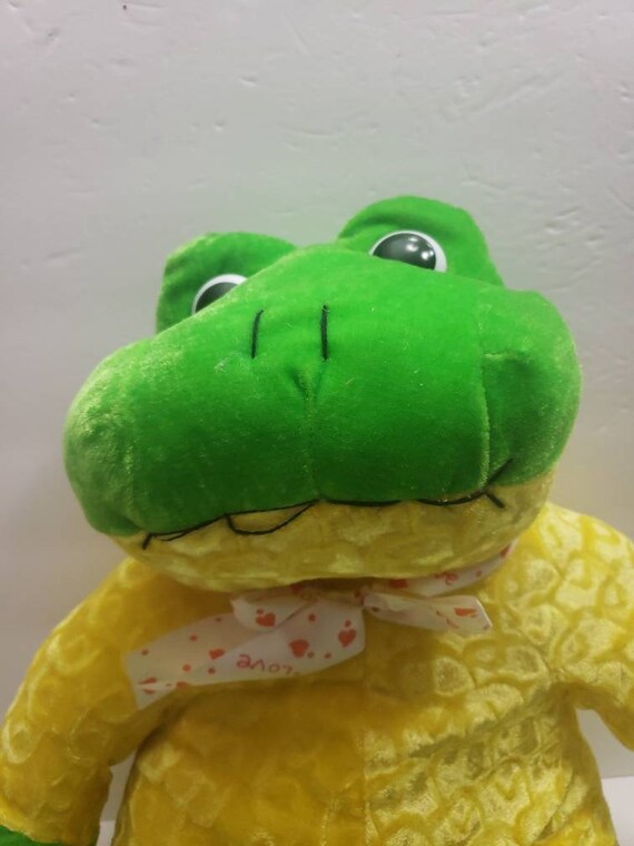 green stuffed frog