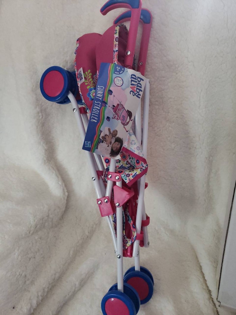 baby alive doll with stroller