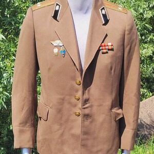 Military rare officer's coat with badges USSR army