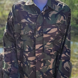 Vintage military summer camouflage jacket
