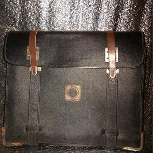 Vintage black hard case briefcase, document organizer, classic old-era travel style