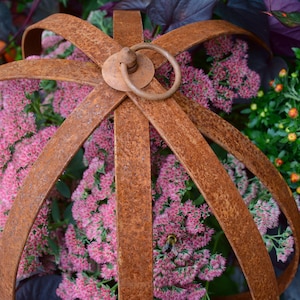 One Medium Elysian Garden® Rusted Orb: Orb consists of 4 hoops with a beautiful rusted patina. Quality steel & handmade in the USA.