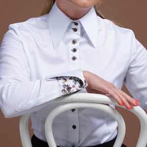 Tailored fit button-up blouse with elegant high collar