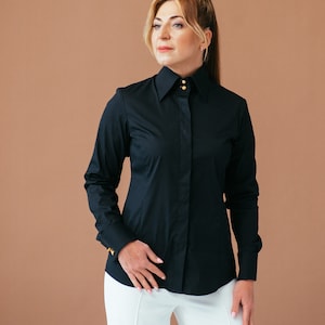 Discover elegance in our Black French Cuff Shirt on Etsy. Crafted from stretch fabric for a slim fit, this dress shirt features French cuffs, a high collar, and gold buttons. Elevate your formalwear with this versatile black blouse for cufflinks.