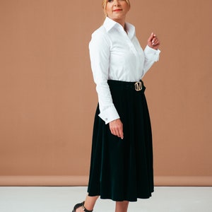 Introducing our women`s French cuff shirt with exquisite and a high collar blouse. This photo showcases its noble design.