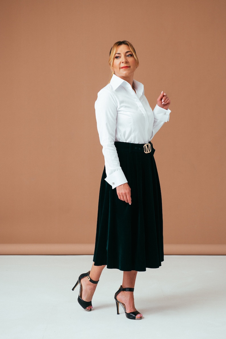 Introducing our women`s French cuff shirt with exquisite and a high collar blouse. This photo showcases its noble design.